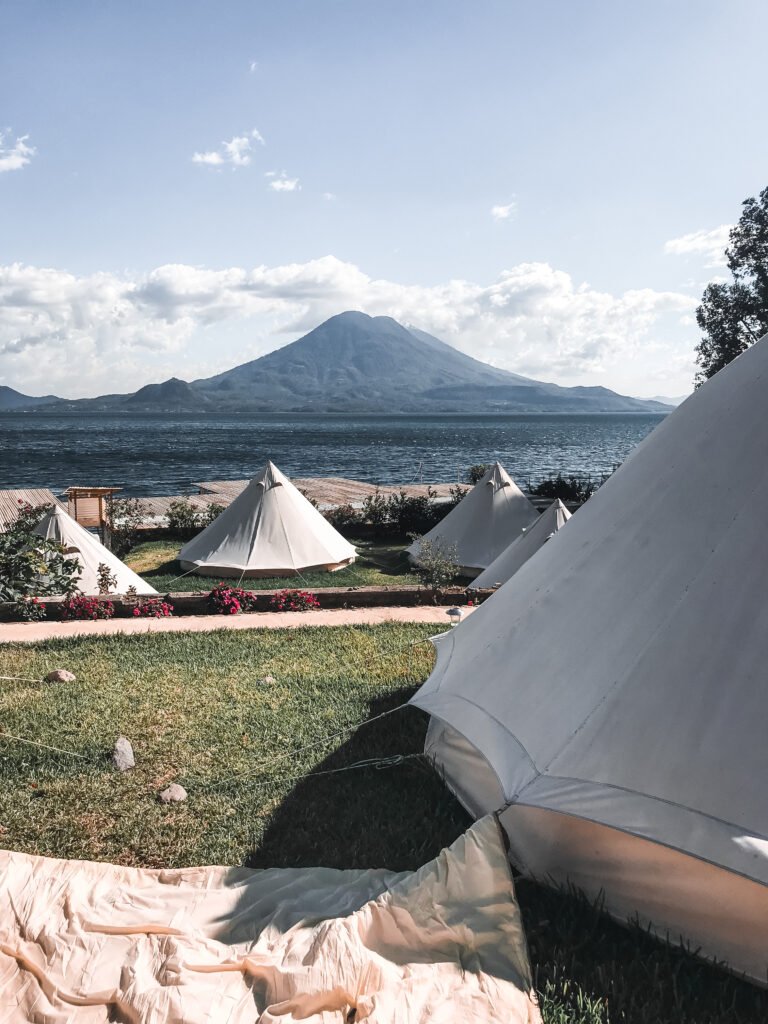 Teepee view of the surrounding volcanoes of Lake Atitlan Guatemala from the hostel Free Cerveza