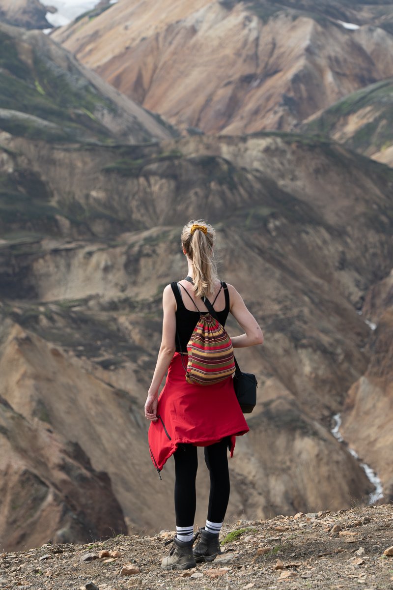 Girl looking out at Landmannalaugar during an Iceland Ring Road Itinerary