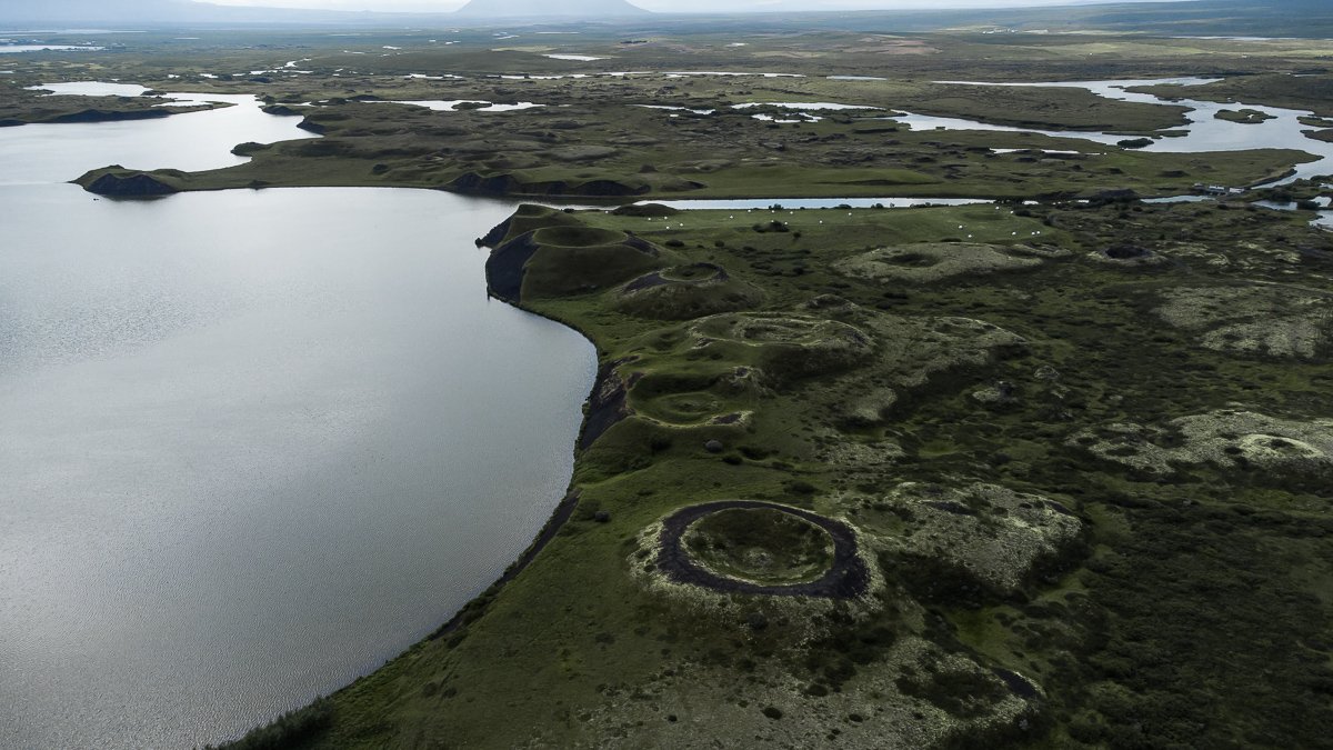 The drone view over some of the Mývatn craters in Iceland
