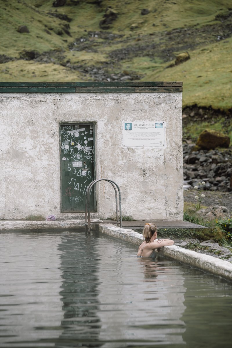 Relaxing in the Seljavallalaug Swimming Pool one of the hot springs in Iceland