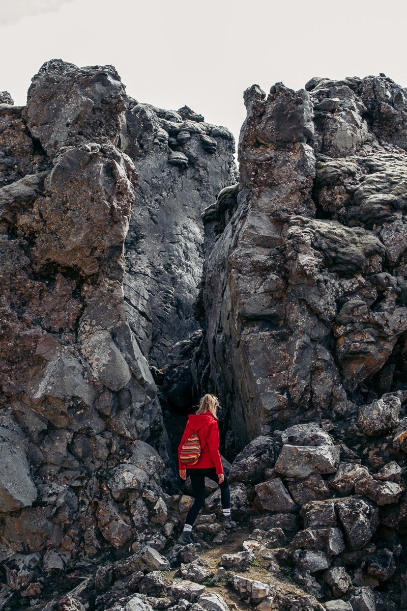 Girl within the rocks of Landmannalaugar